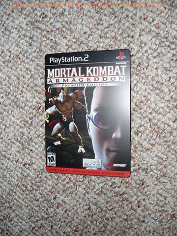 Burn11250-MK-Games-PS2-Armageddon-Premium-Edition-Goro-vs-Johnny-Cage.jpg